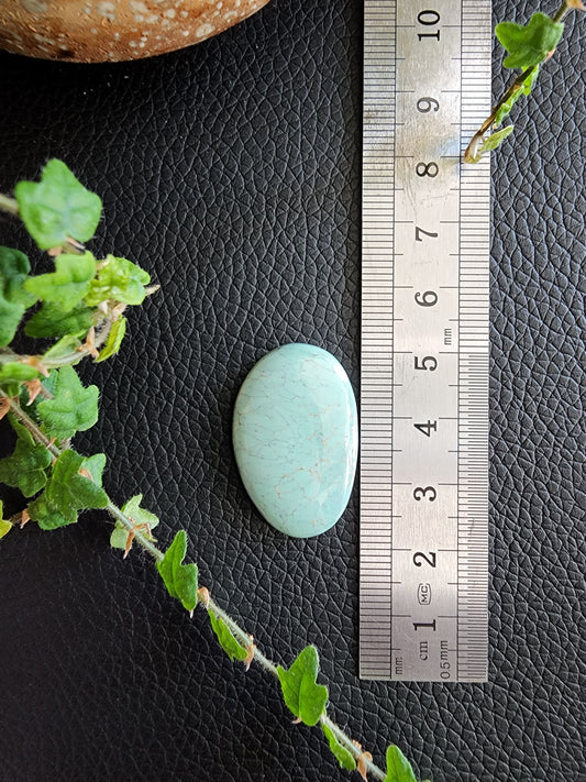 Broken arrow turquoise cabochon